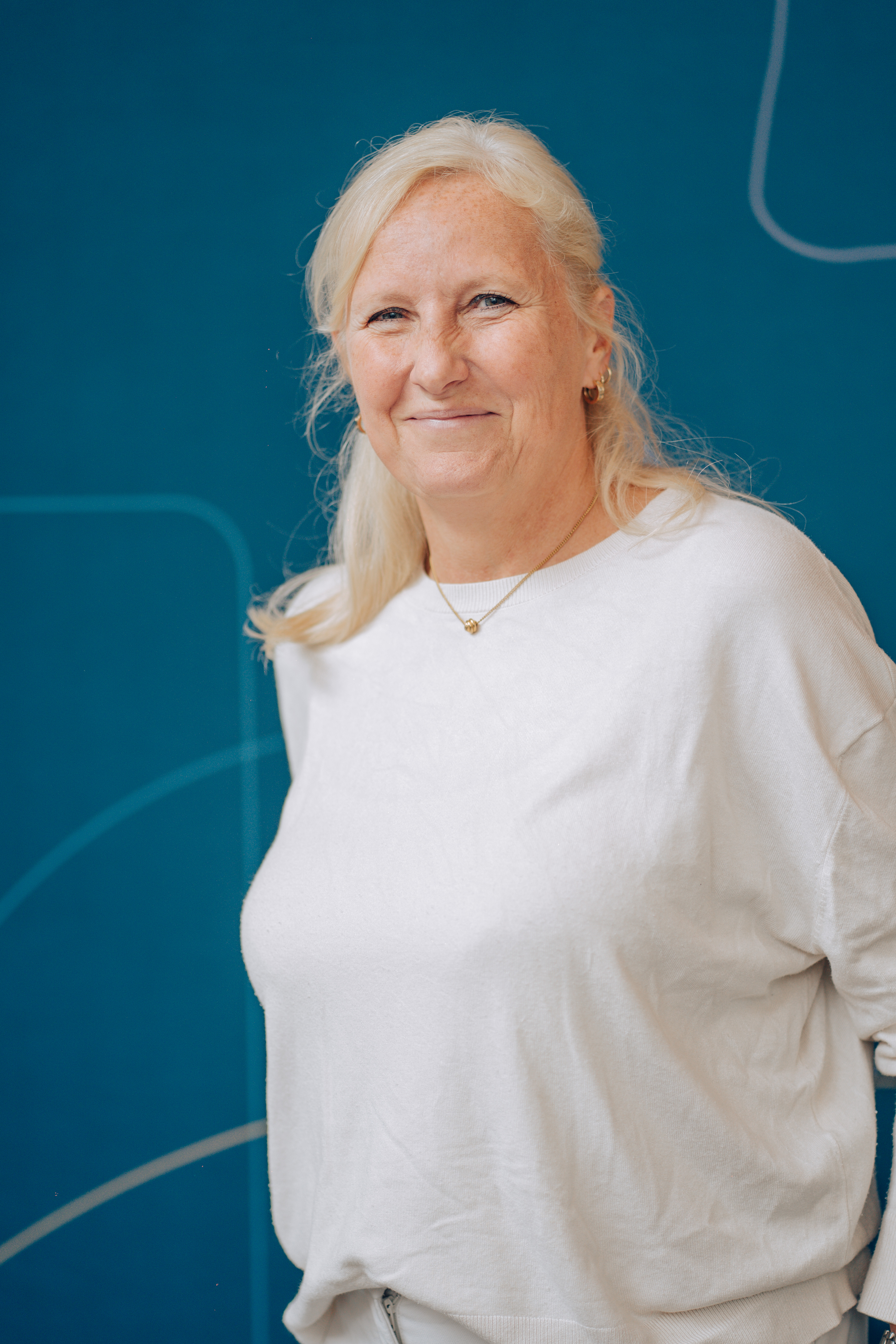 Menueservice-Marketing-Summit_Eine Teilnehmerin lacht in die Kamera